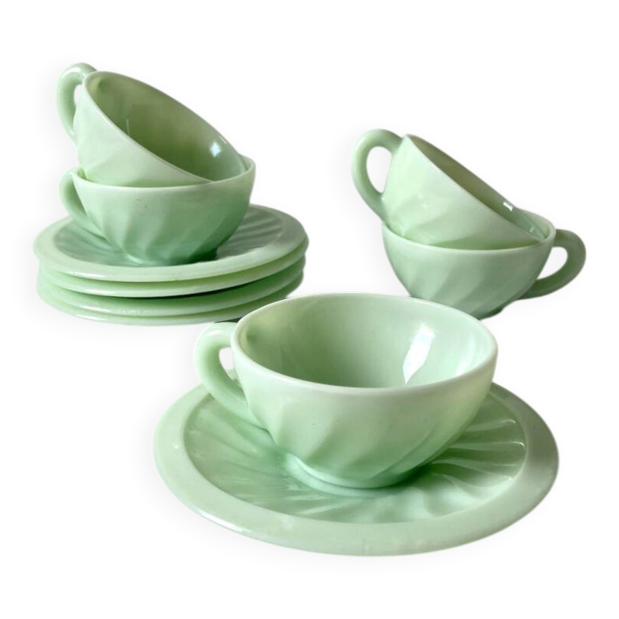 Pressed glass cups and saucers, 1950s