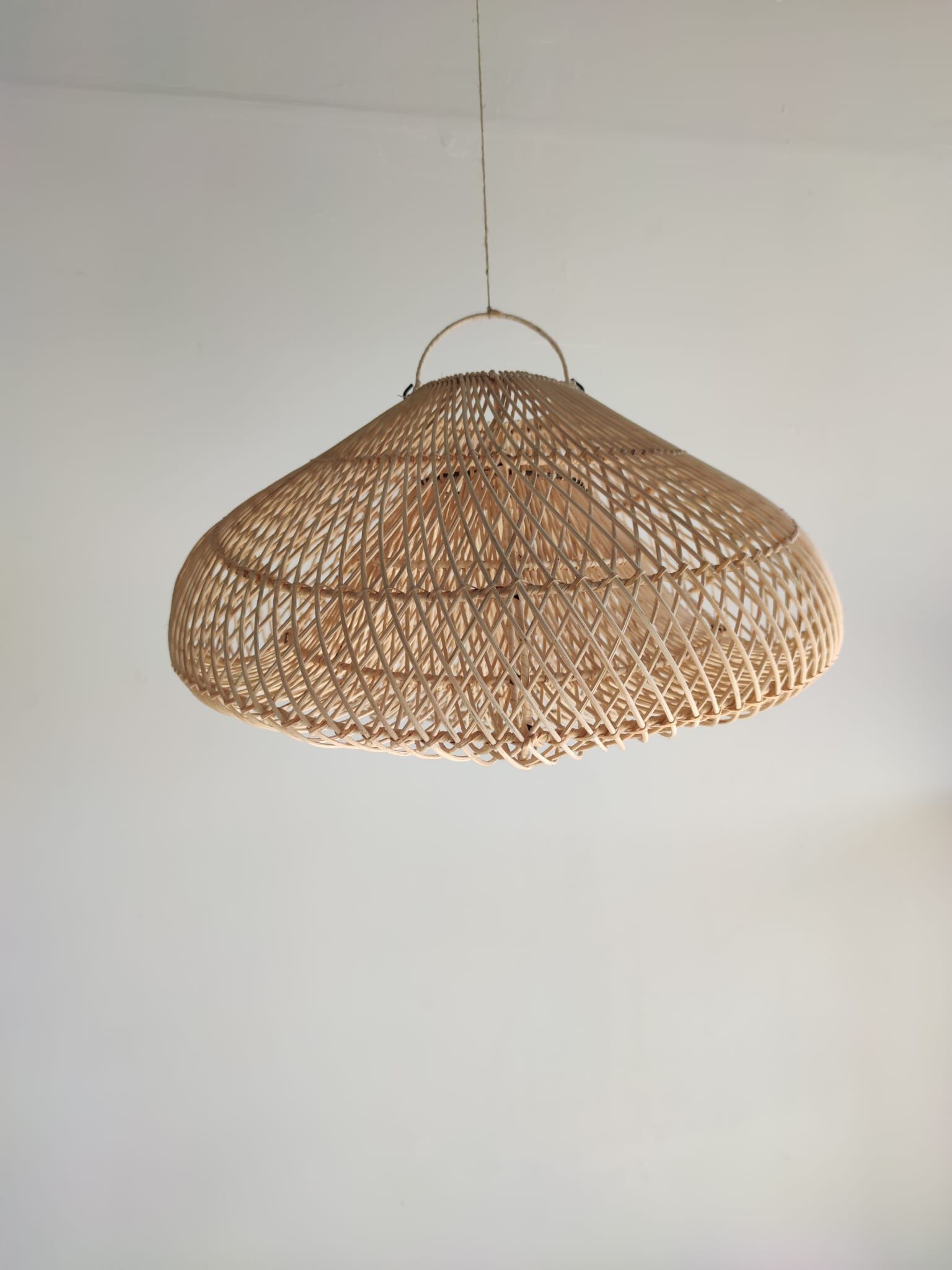 Small rattan lampshade in the shape of a braided hat