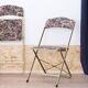 2 folding chairs with CHAISOR flower tapestry