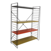 Vintage metal Tomado shelf to place