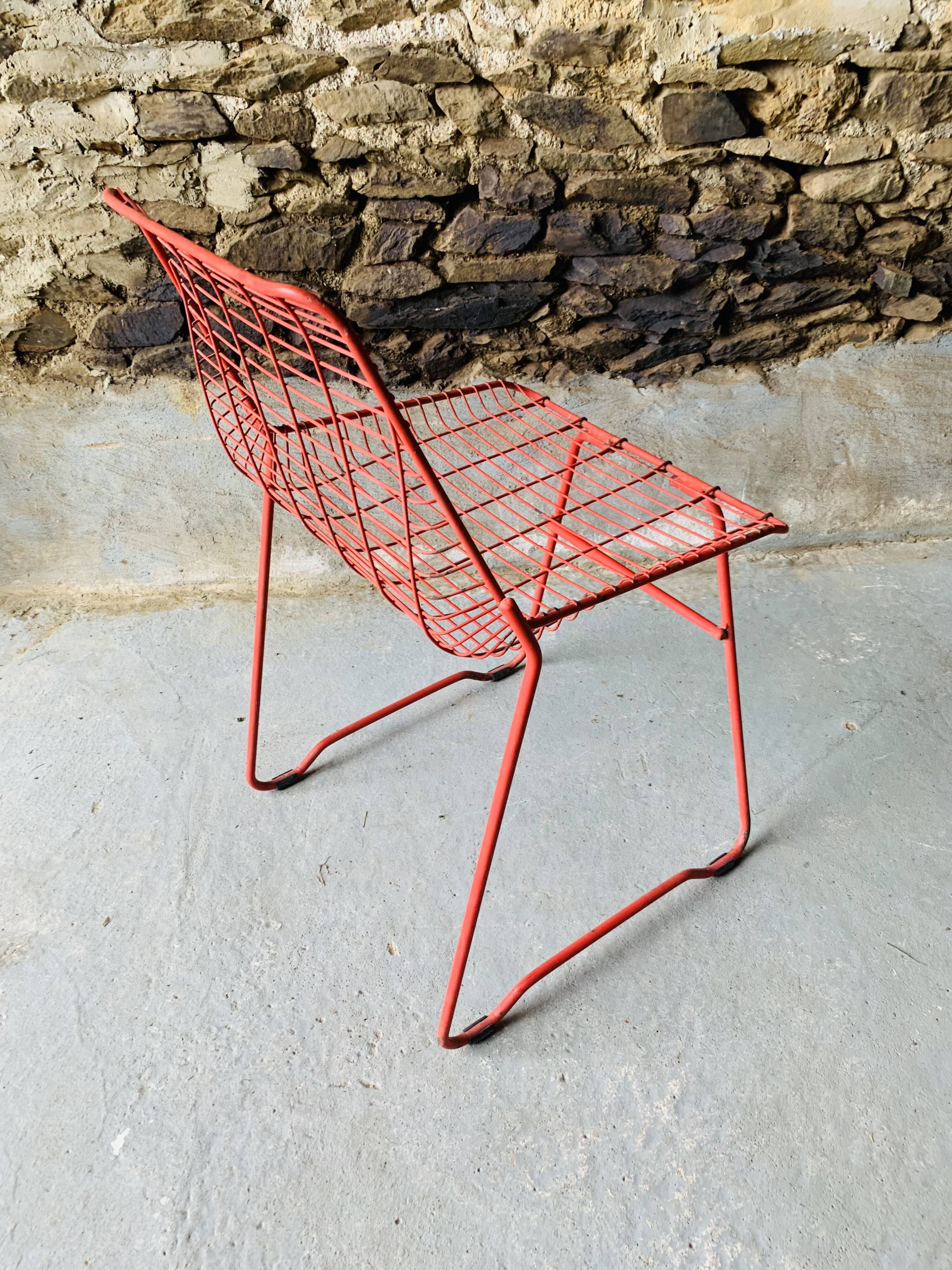 4 red design chairs