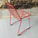 4 red design chairs