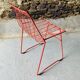 4 red design chairs