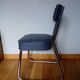 Bauhaus industrial style office chair shaped sled or sled in chrome tubular metal and skai