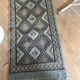 Handmade turquoise and beige wool rug, new.