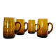 4 mugs/ mugs in vintage blown amber glass