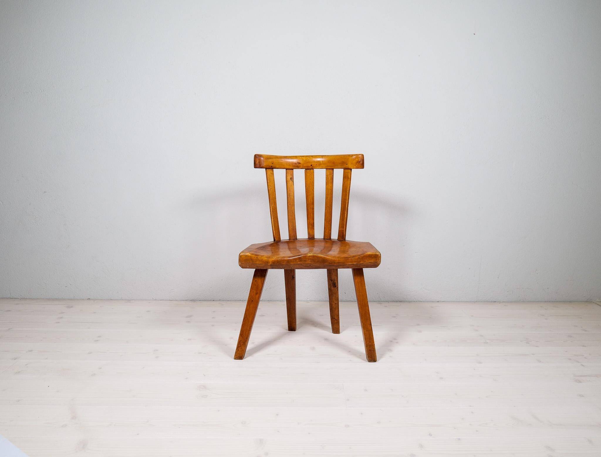 Swedish folk art chair from the 19th century with highly decorative forms.