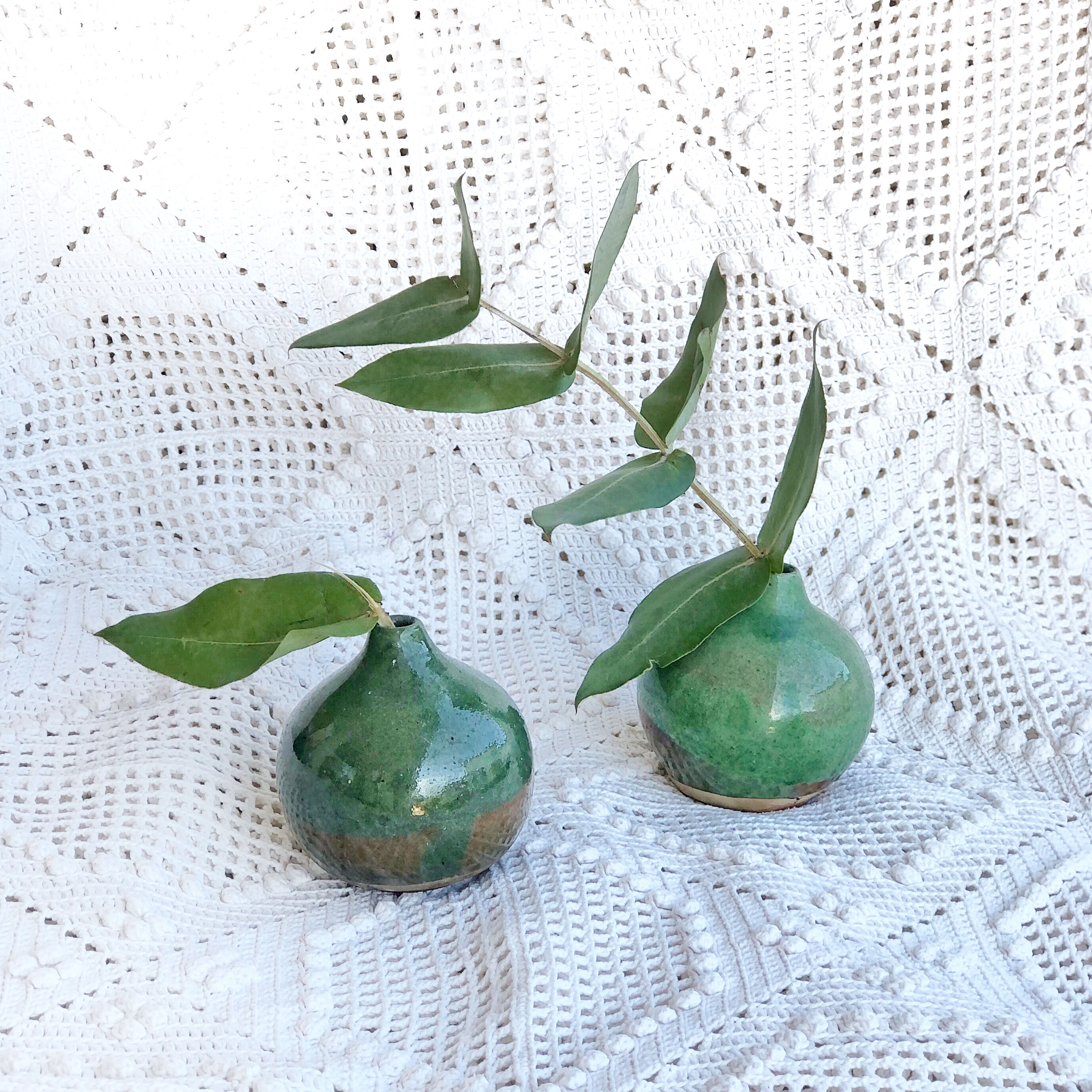 Two handcrafted enamelled ceramic vases
