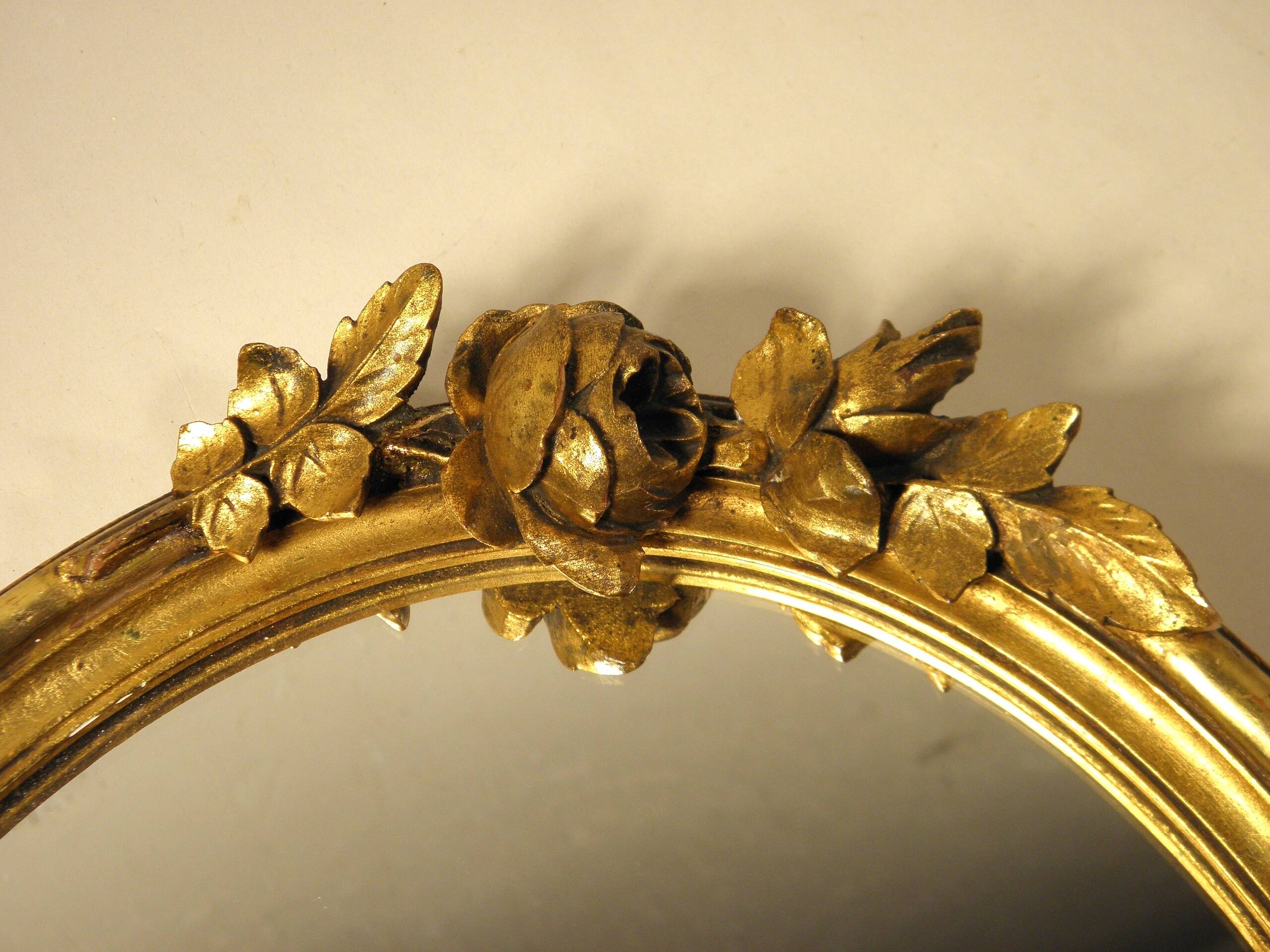 Oval gilded wood mirror 45 x 34