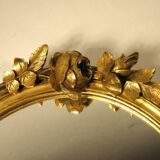 Oval gilded wood mirror 45 x 34