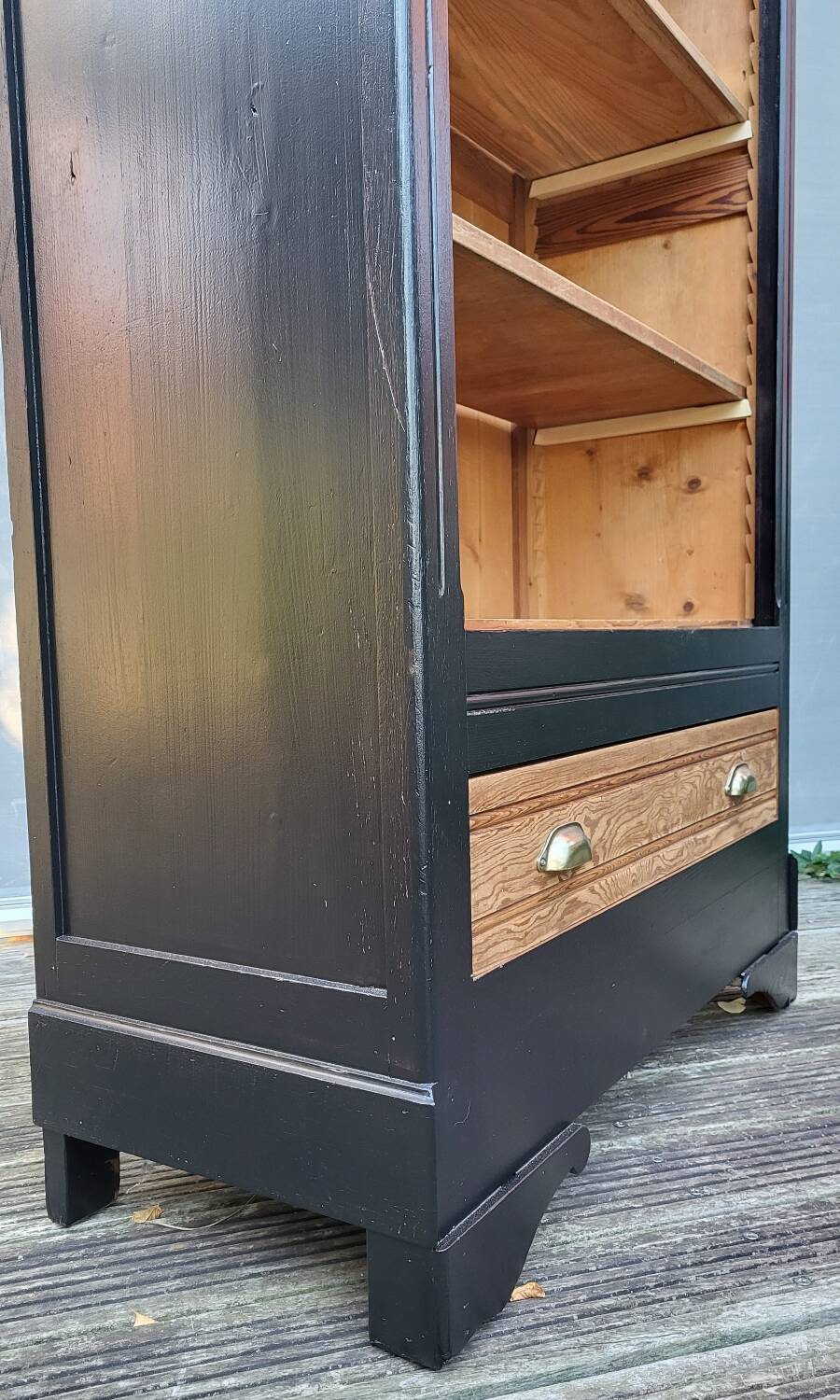 Two-tone black and honey bookcase