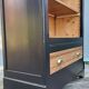 Two-tone black and honey bookcase