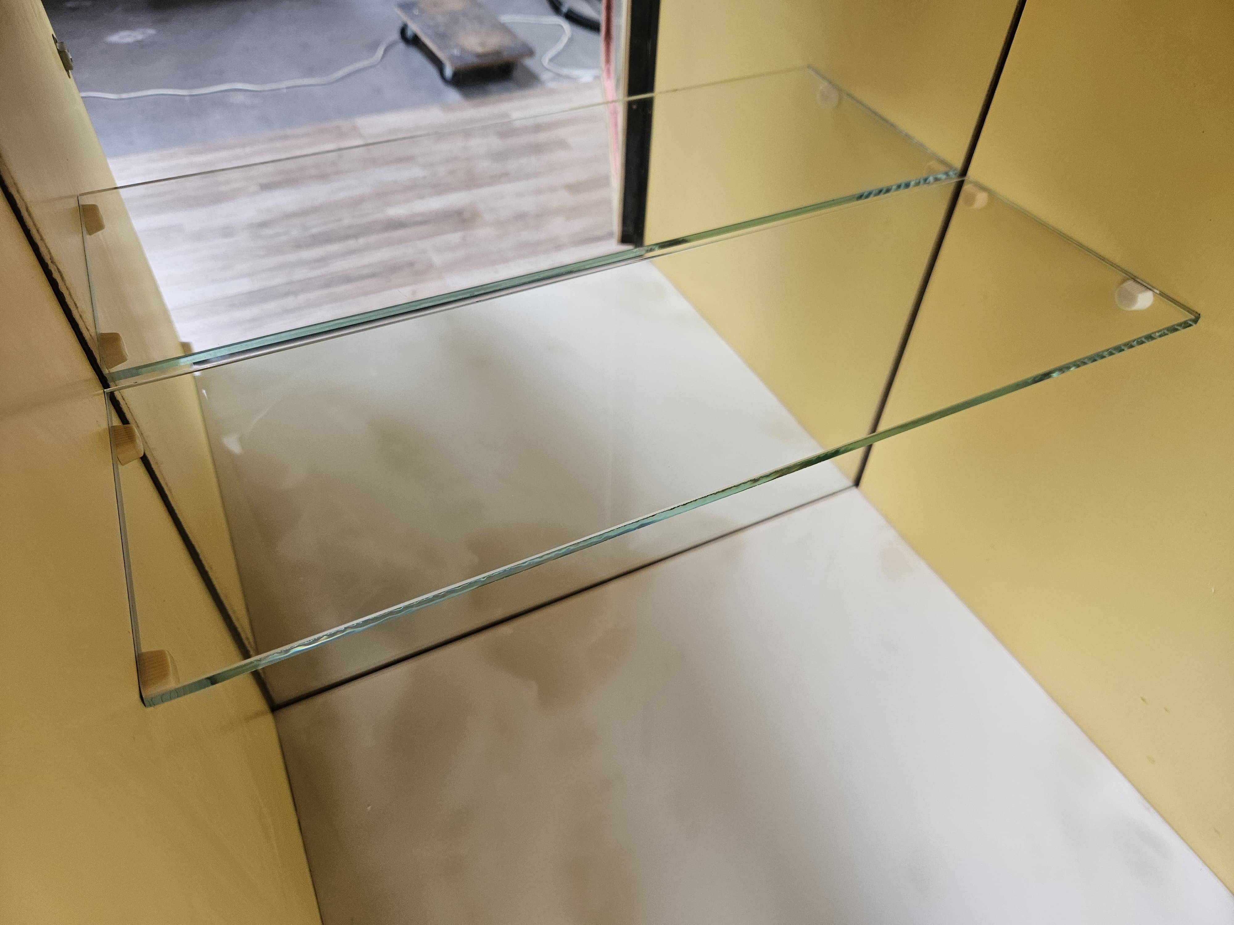 Mid-century 1960s mahogany showcase with glass top