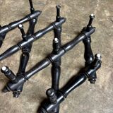 Napoleon III hinged wall-mounted coat rack in black wood