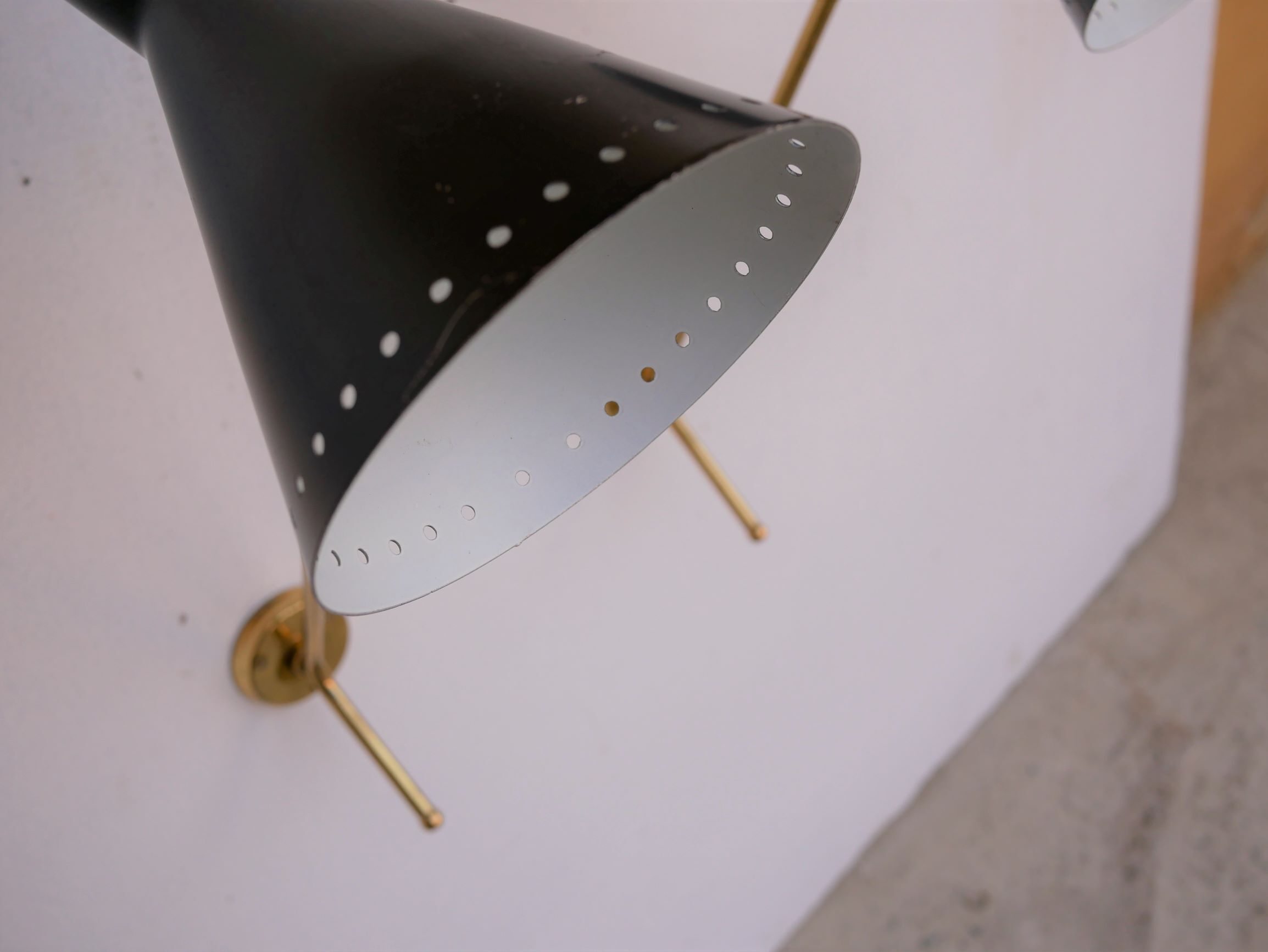 Vintage "Diabolo" wall apply in black metal and brass