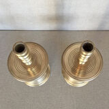 Pair of bronze church candle holders