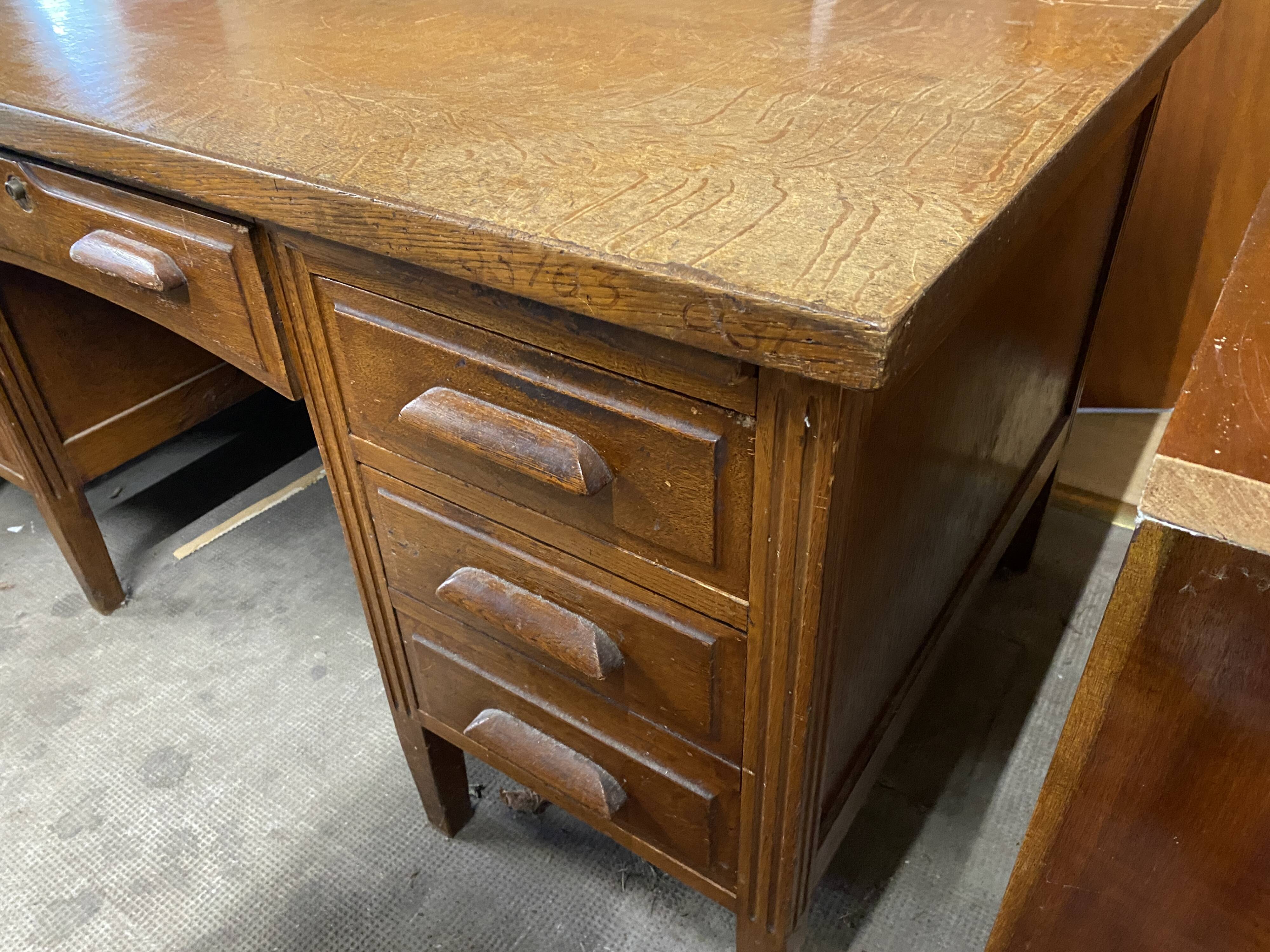 Teacher's desk from the 1950s on legs.