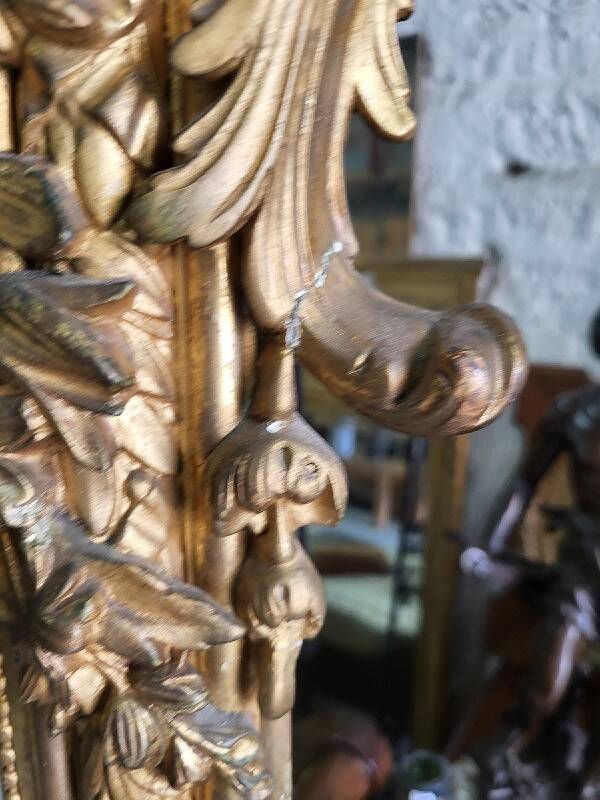 Large Louis XV gilded shell mirror from the 19th century