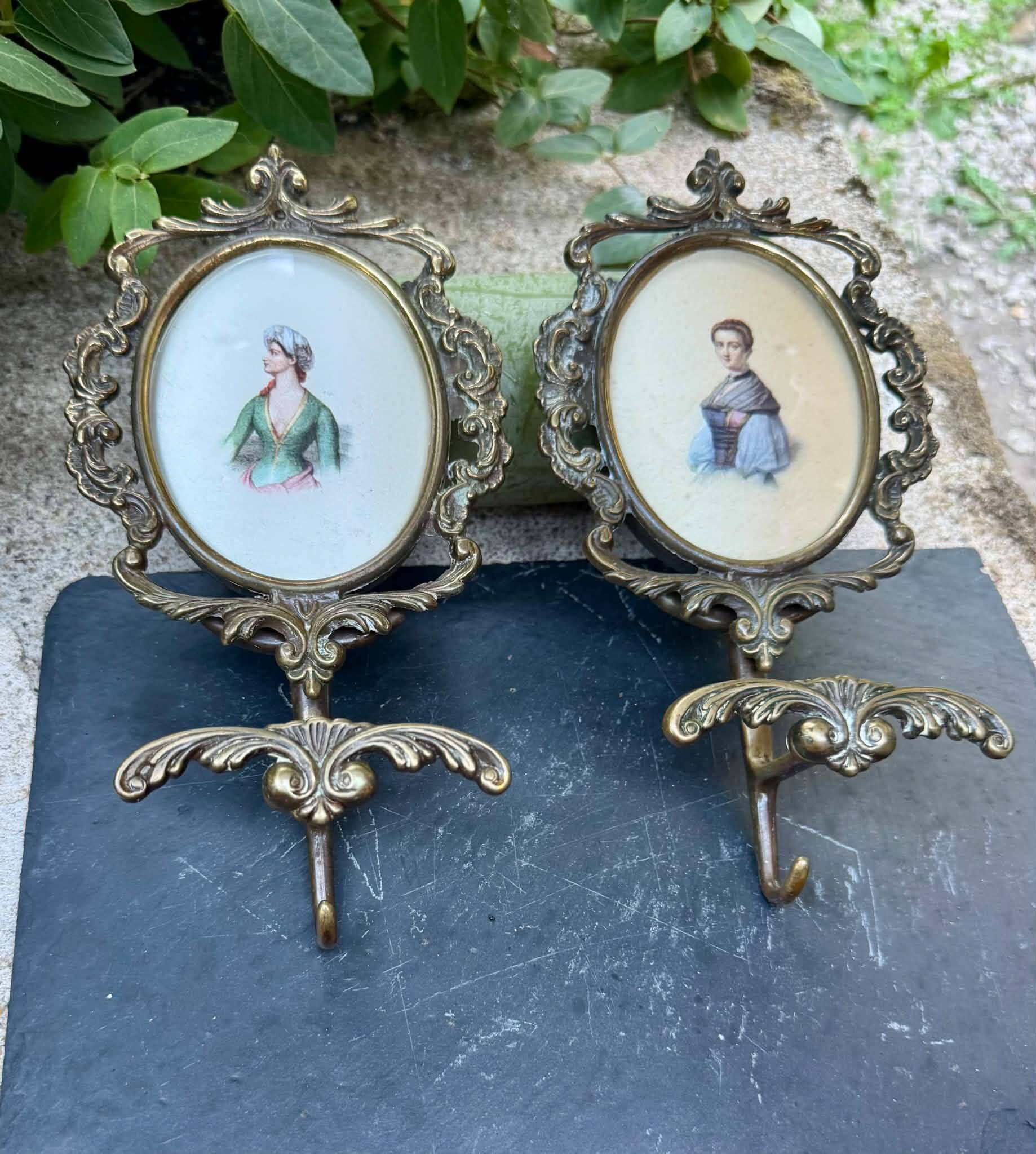 Pair of baroque brass coat hooks