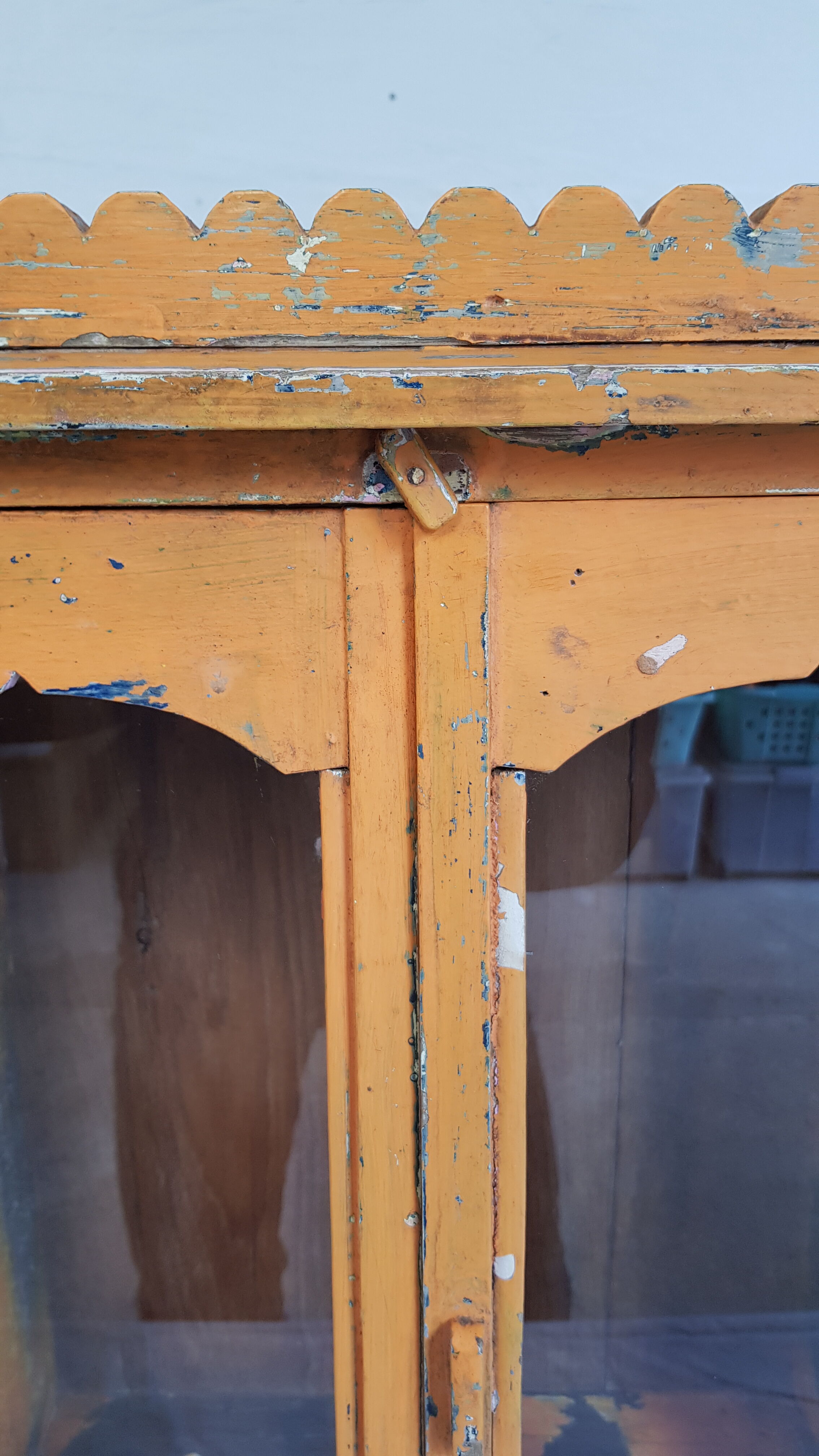 Old temple-showcase with teak offerings