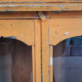 Old temple-showcase with teak offerings