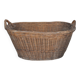 Rustic brown wicker basket from the 1940s — large oval laundry basket