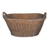 Rustic brown wicker basket from the 1940s — large oval laundry basket