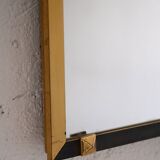 Vintage rectangular mirror with gold and black metal frame