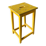 Yellow wooden high stool