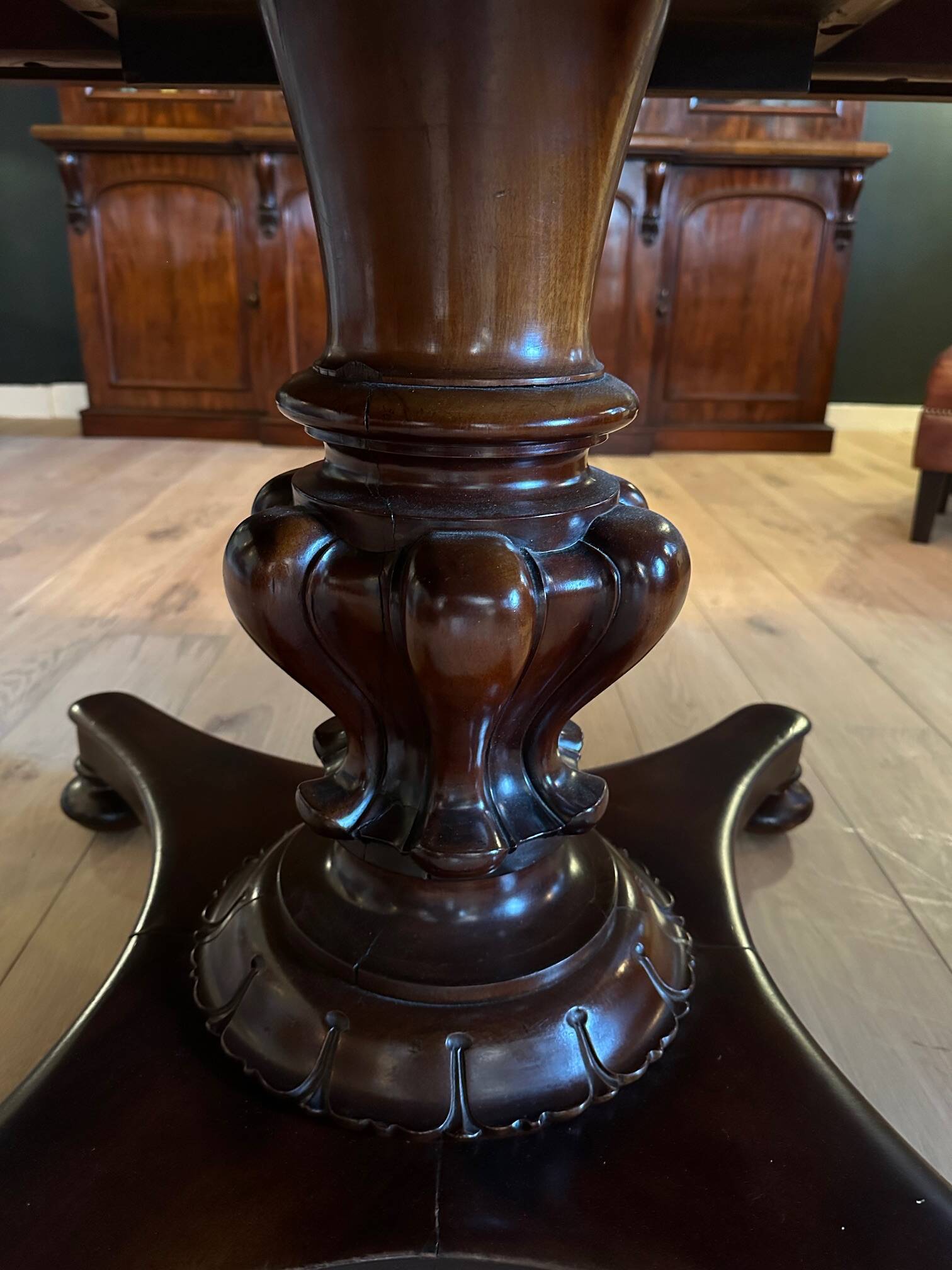 19th century almost square antique mahogany dining table.