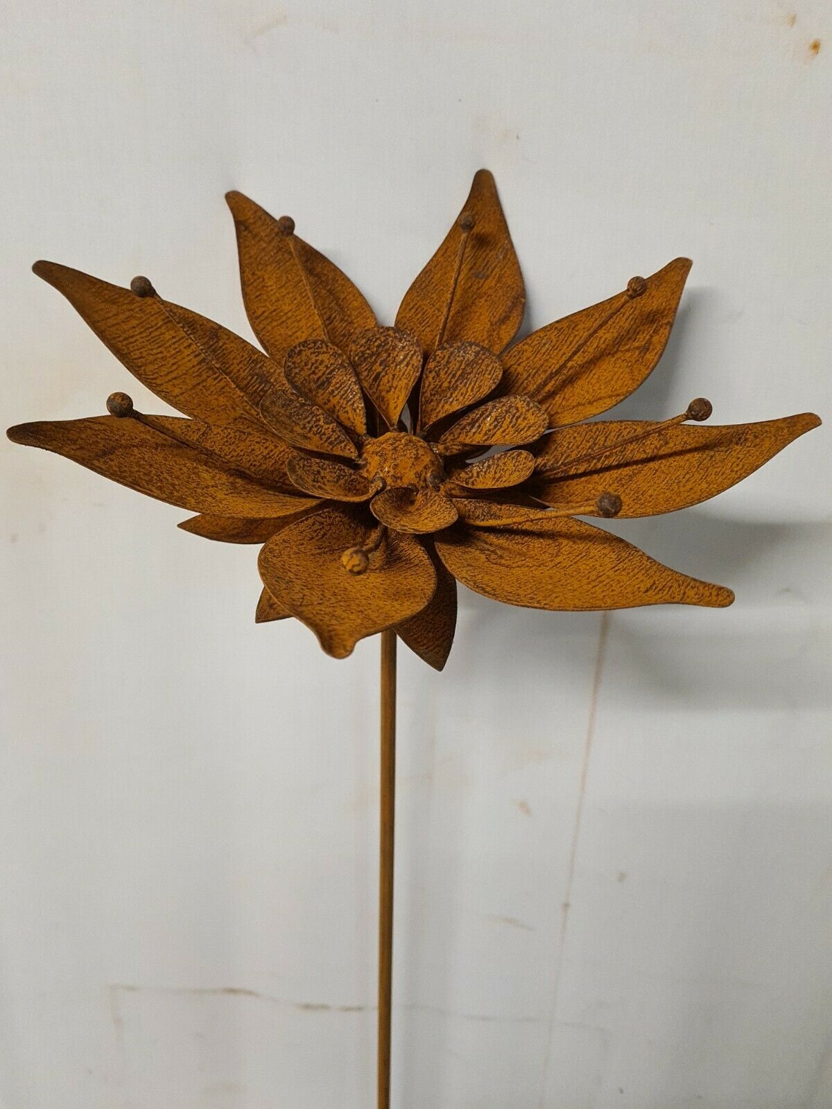 Iron flower on stem, garden decoration