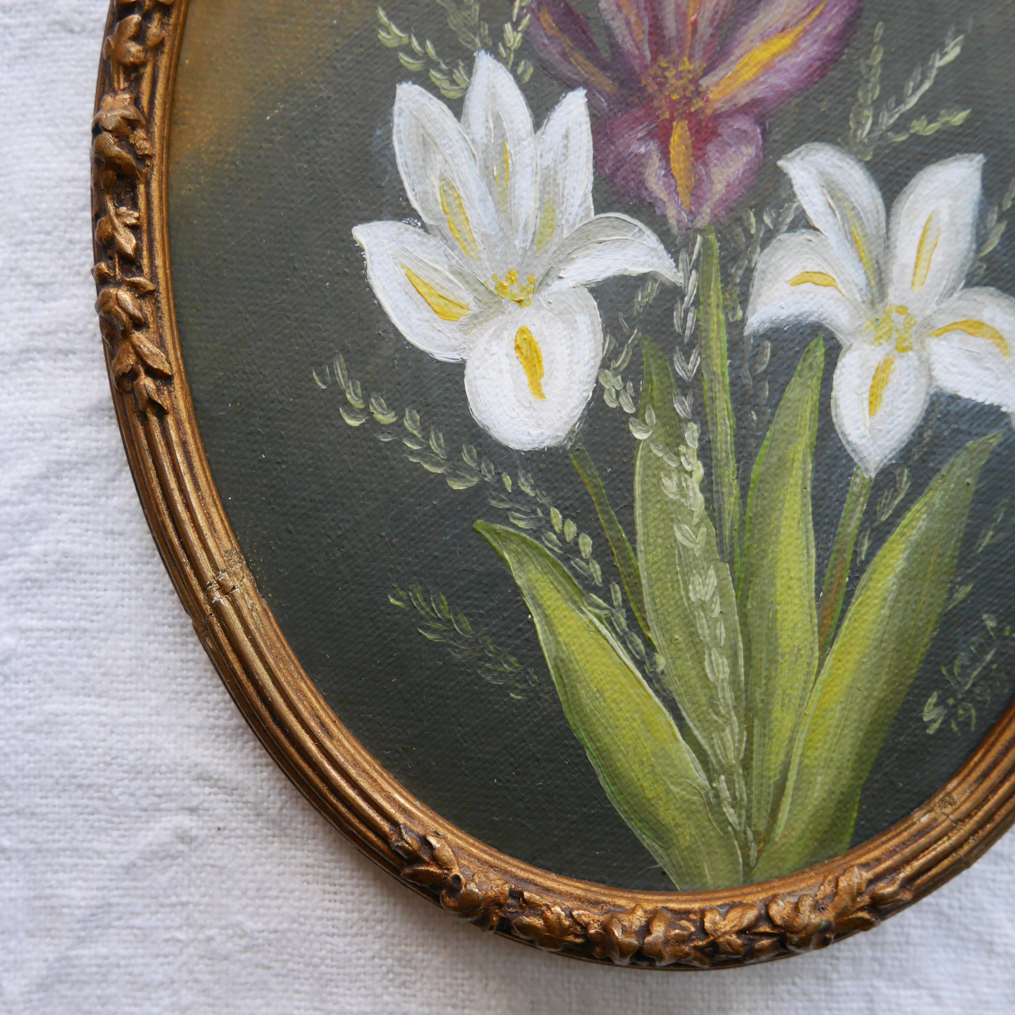 Set of 2 small oval paintings, flowers