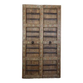 Indian door in natural teak and brass cabochons