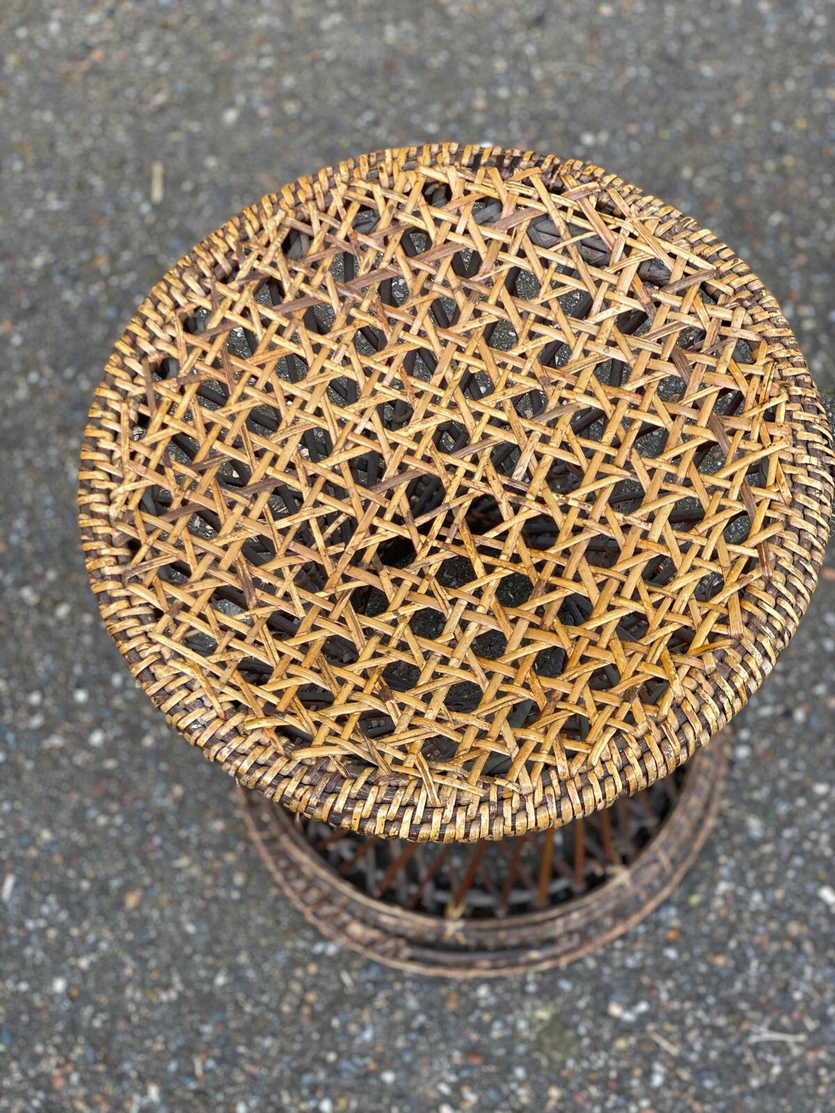 Round tamtam diabolo stool in rattan and woven wicker.
