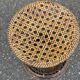 Round tamtam diabolo stool in rattan and woven wicker.