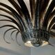 Silver wrought iron sunburst wall light from the 1960s.
