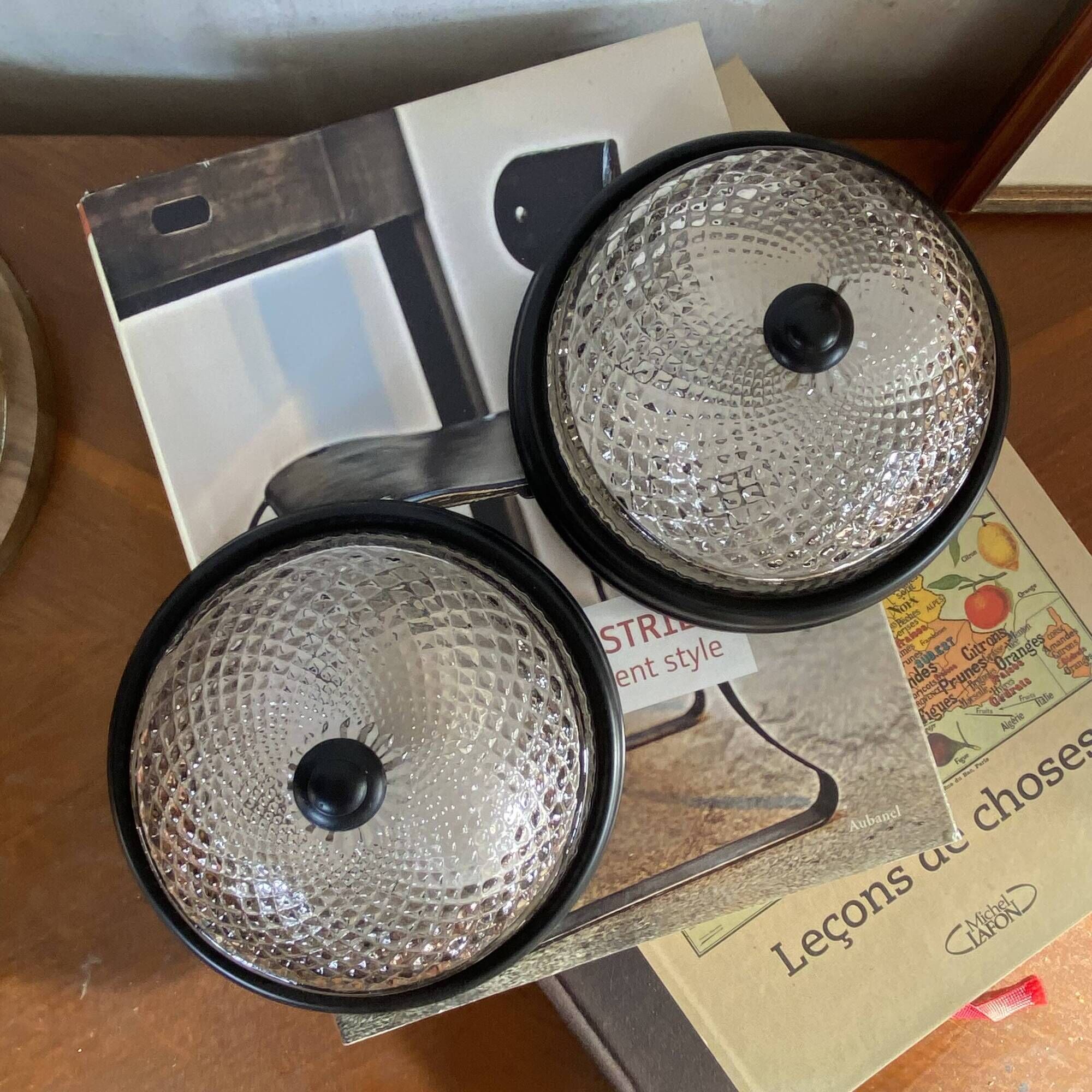 Small pair of vintage ceiling sconces in glass and black metal.