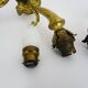 Pair of double-light Empire style wall lights in bronze