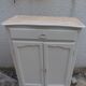 Small vintage buffet reimagined in pearl grey, wooden top.