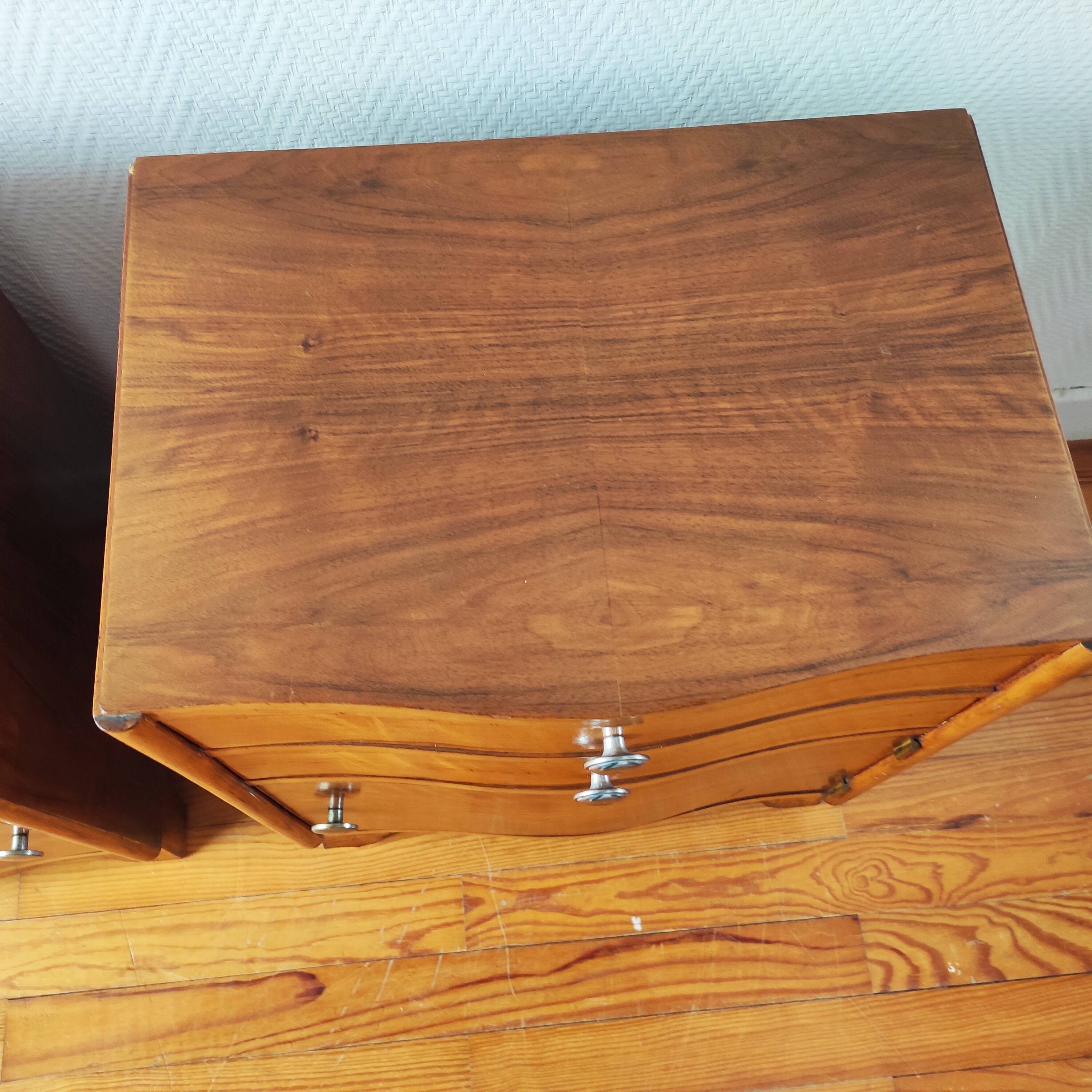 Pair of Art Deco curved bedside tables in light wood.