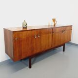Vintage Scandinavian style row in rosewood and brass from the 60s