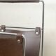 Modernist magazine rack in brown leather & chrome wire metal – 1970 design