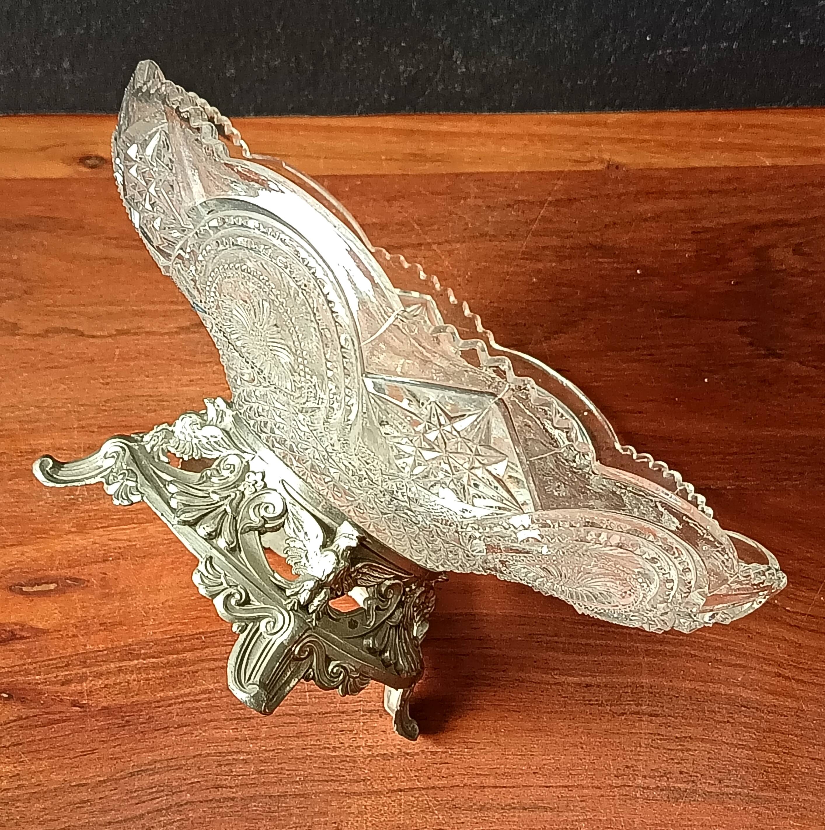 Transparent glass dish on vintage metal stand