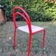 Stackable chairs, Italy, 1980s, red metal, white vinyl