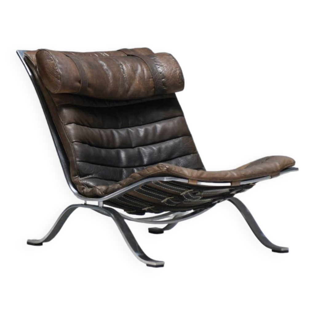 Stunning patinated ARI lounge chair in brown leather by Arne Norell M bel AB
