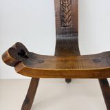 Brutalist hand carved oak Spanish tripod chair , 1970s