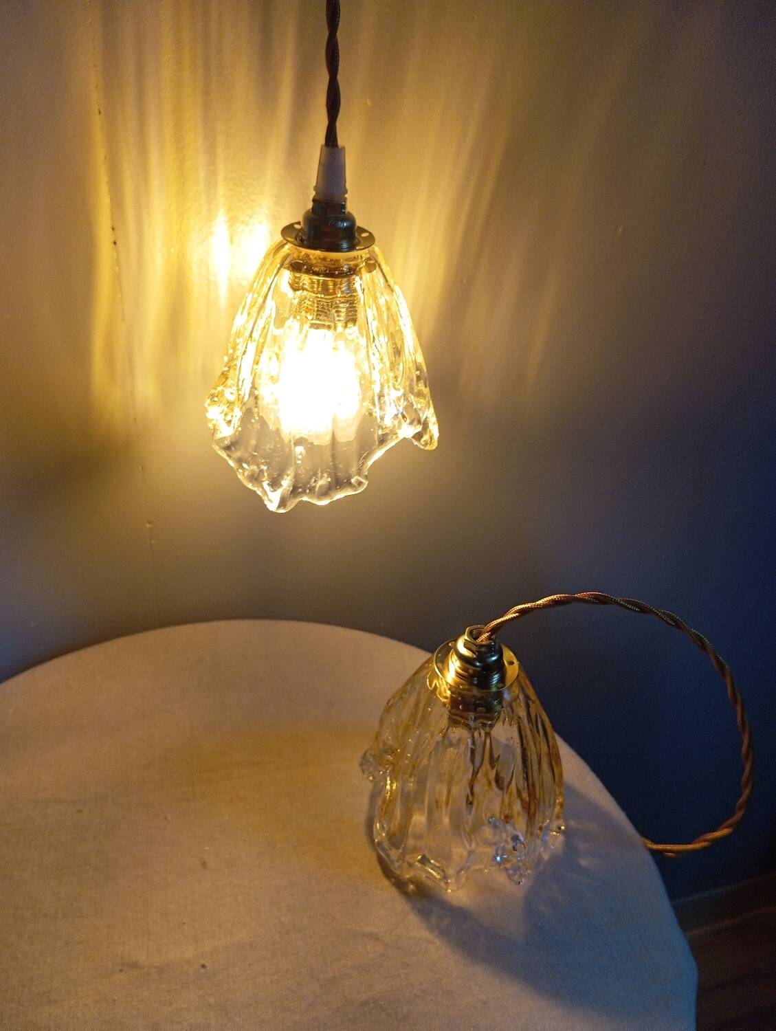 Pair of draped blown glass hanging lamps, ocher twisted wire