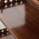Elegant wooden  bookcase with a classic English look from the 20th century