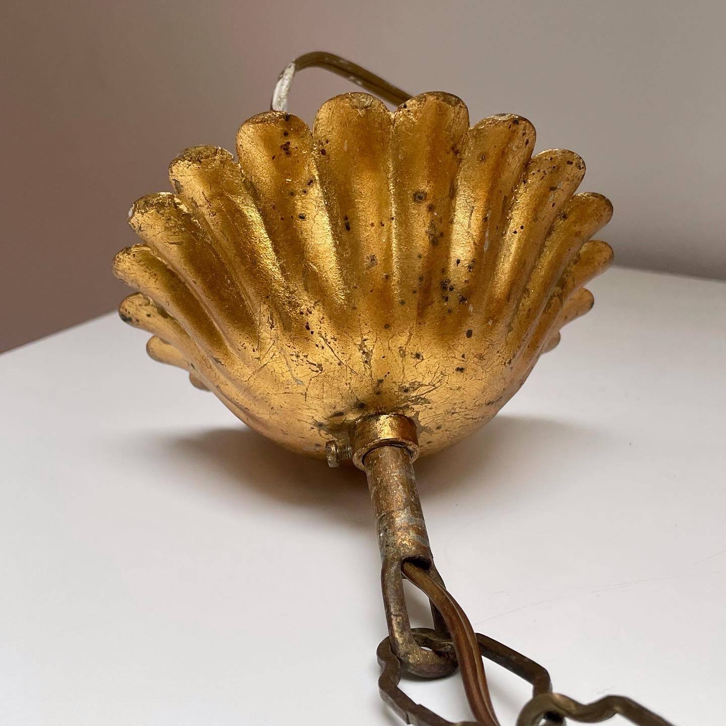 Two vintage pendant lights in gold metal