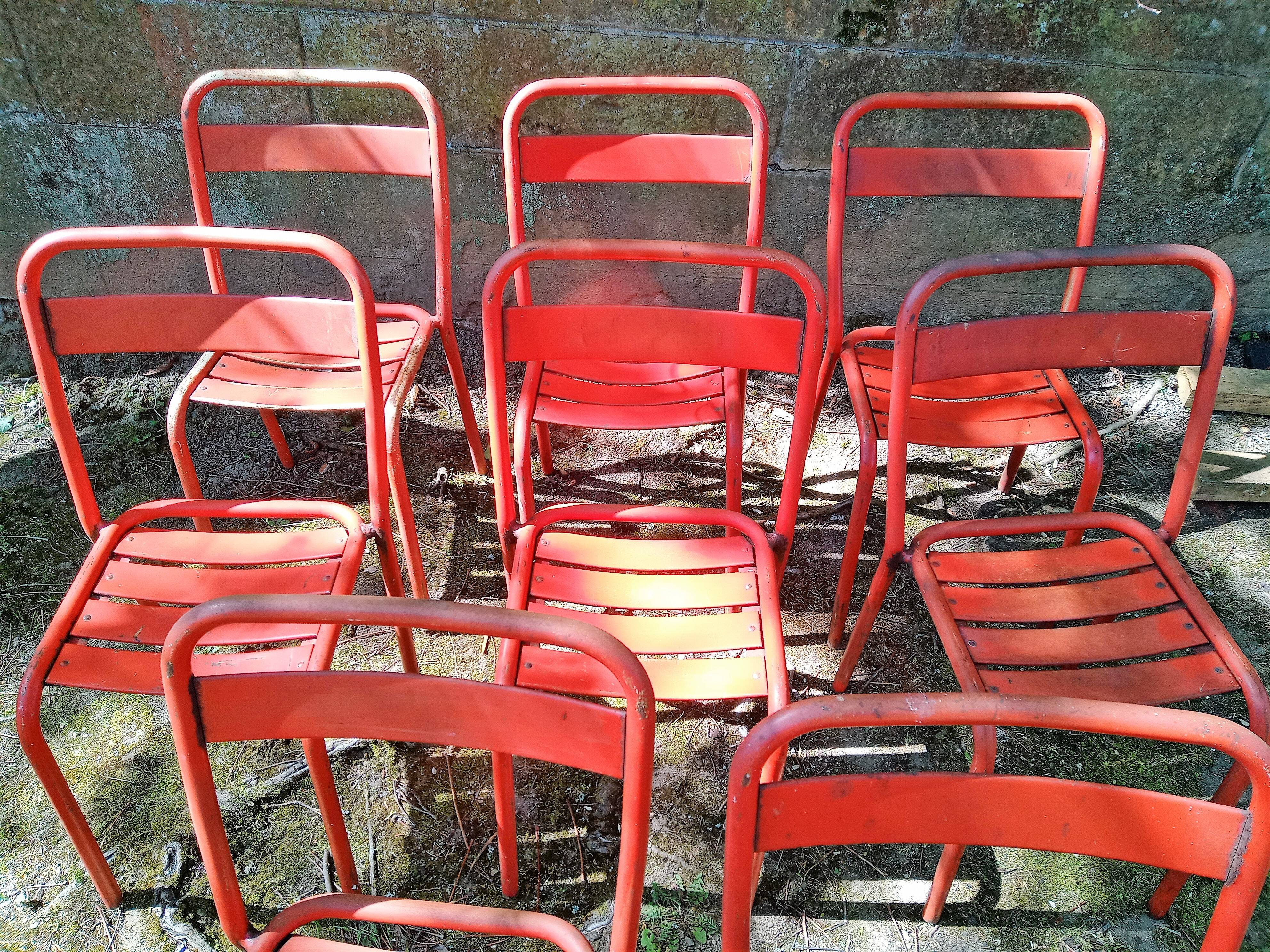 Series of 8 red Tolix chairs